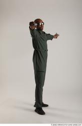 ERIC PILOT STANDING POSE WITH GUNS